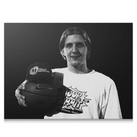 Full portrait, black and white archival print of Dirk Nowitzki - #3 holding a Dallas Mavericks hat.