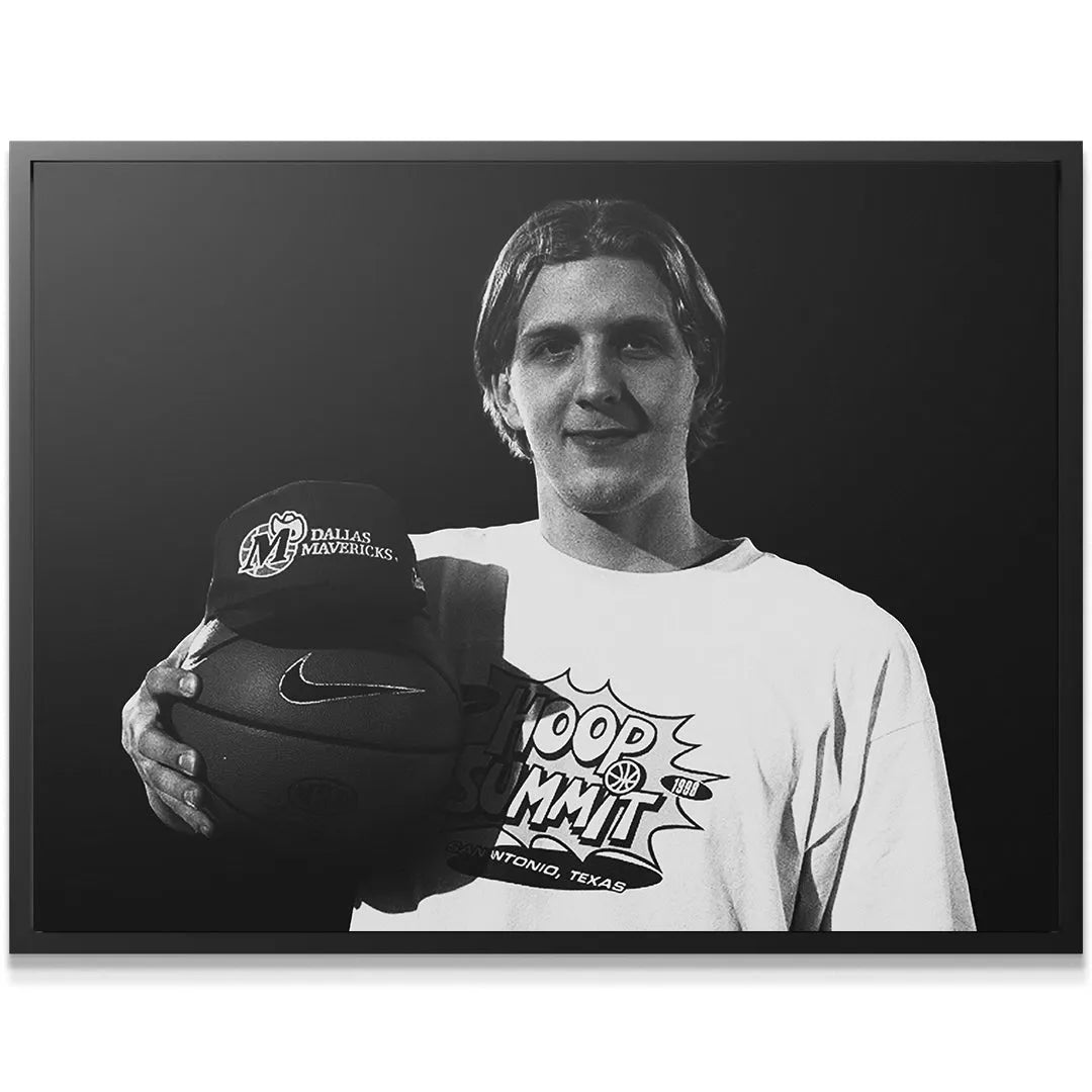 Close-up of young Dirk Nowitzki - #3 smiling while wearing a 1998 Hoop Summit t-shirt.
