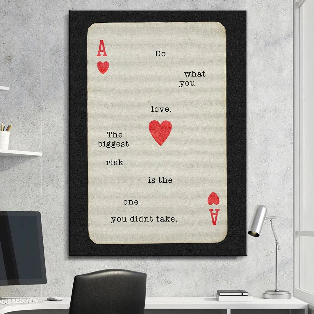 Angled perspective capturing the distressed edges and bold red heart icon on the "Do What You Love" poster.