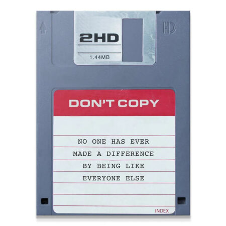 Full frontal shot of the gray 3.5-inch floppy disk art featuring the red and white 'Don't Copy' label.