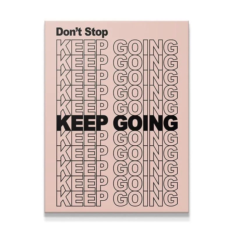 Full frontal view of the 'Don't Stop Keep Going' motivational typography print on a pale pink background.