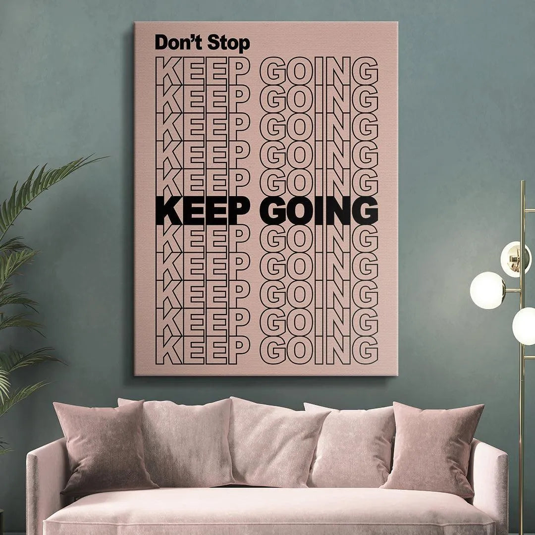 Corner detail of the print highlighting the bold 'KEEP GOING' line within the repetitive 'Don't Stop Keep Going' pattern.
