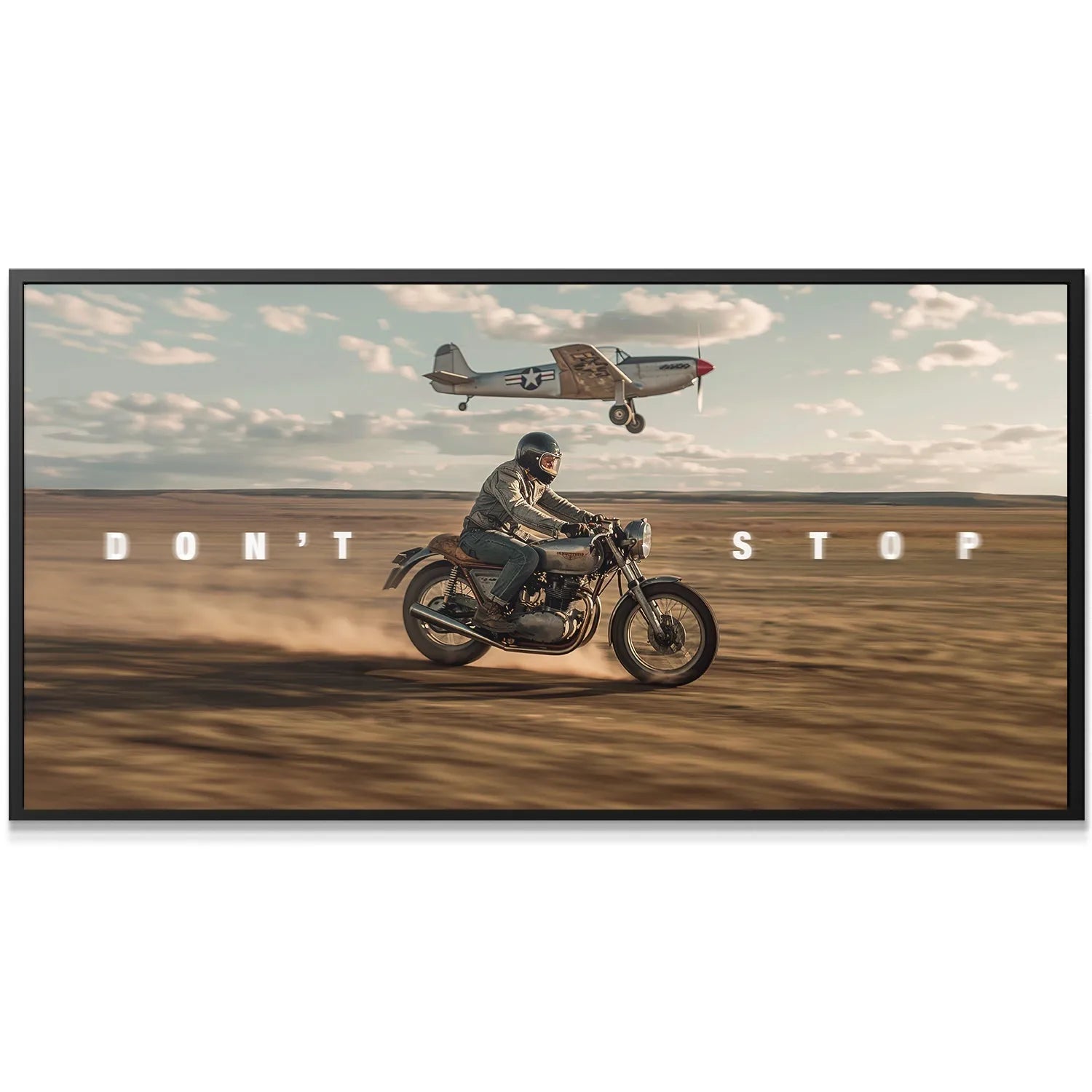 Close-up view of the cafe racer motorcycle tire kicking up a large dust cloud, symbolizing 'Don't Stop Racing' speed.
