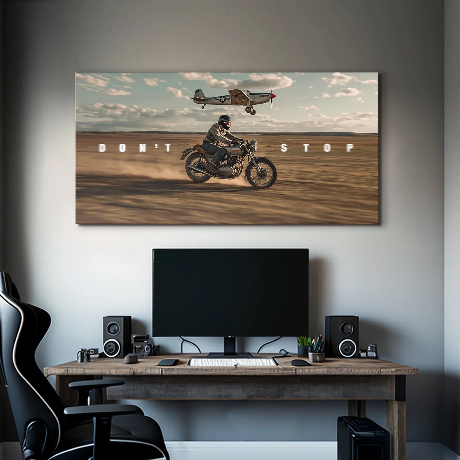 Lifestyle depiction of the art print mounted in an industrial setting, reflecting the 'Don't Stop Racing' theme.