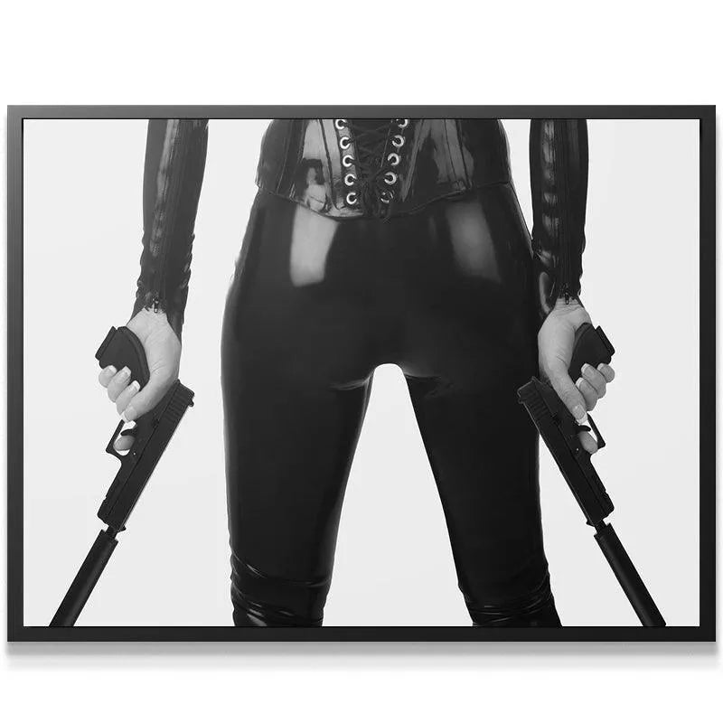 Reflective black latex pants emphasizing the tight fit in this provocative 'Double Trouble' art.