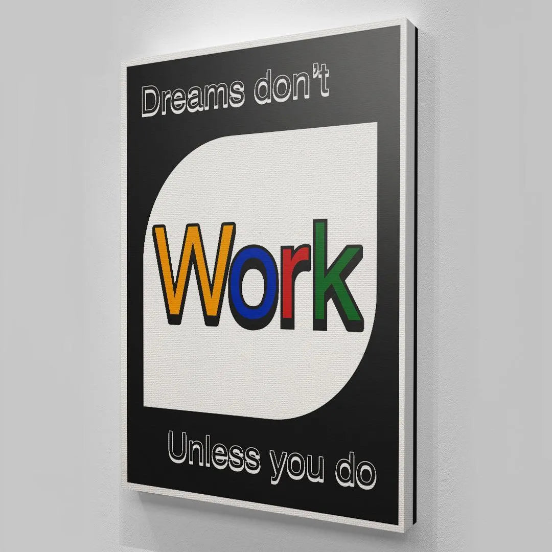 Tight focus on the upper white text border reading 'Dreams Don't Work' at the top of the motivational print.