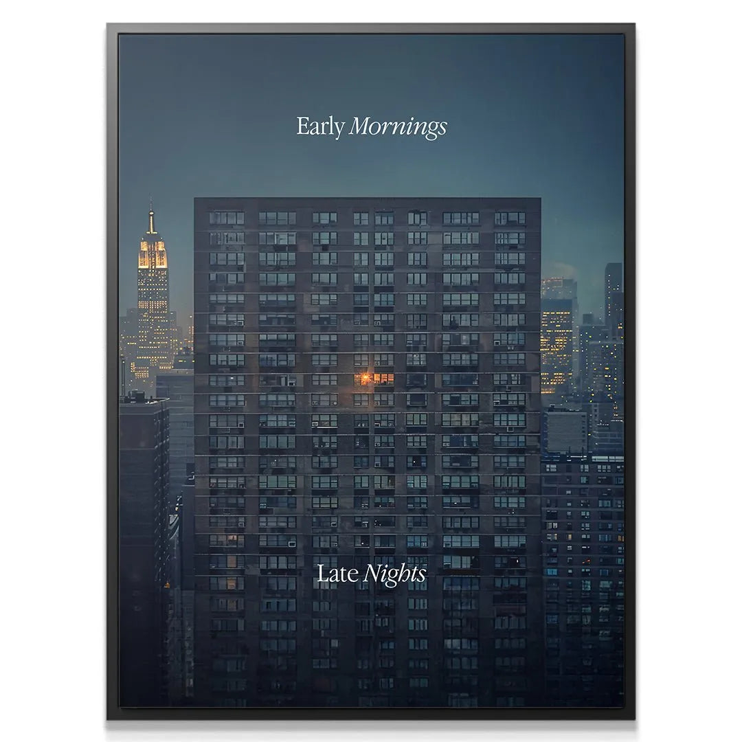 Detail view showing the single brightly illuminated window within the 'Early Mornings, Late Nights' facade texture.