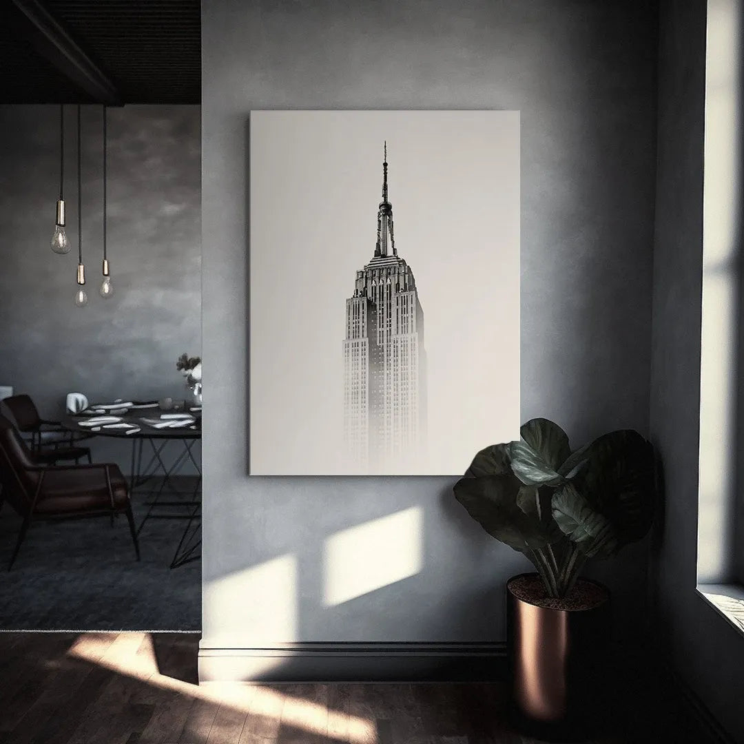 Vertical shot of the magnificent Empire State building viewed from a low angle emphasizing its height.
