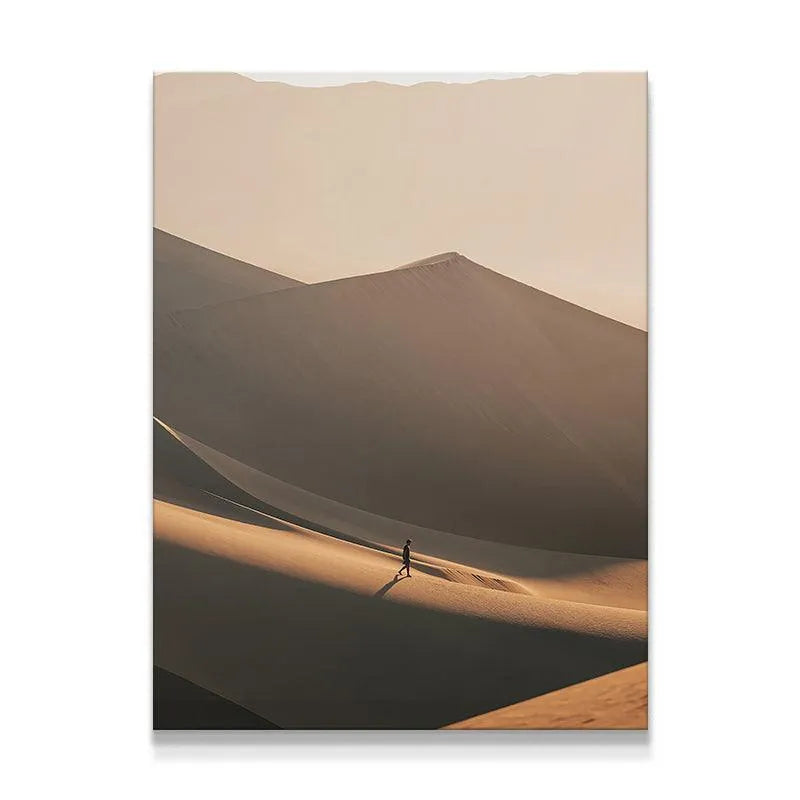 Close-up view of the solitary figure walking across the sunlit ridge in 'Endless Sands' print.
