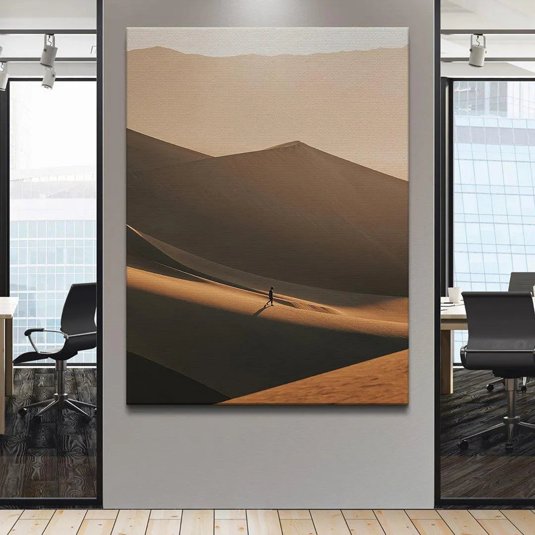 Lifestyle angle showing the 'Endless Sands' print displayed above a neutral, modern sofa in a living room setting.