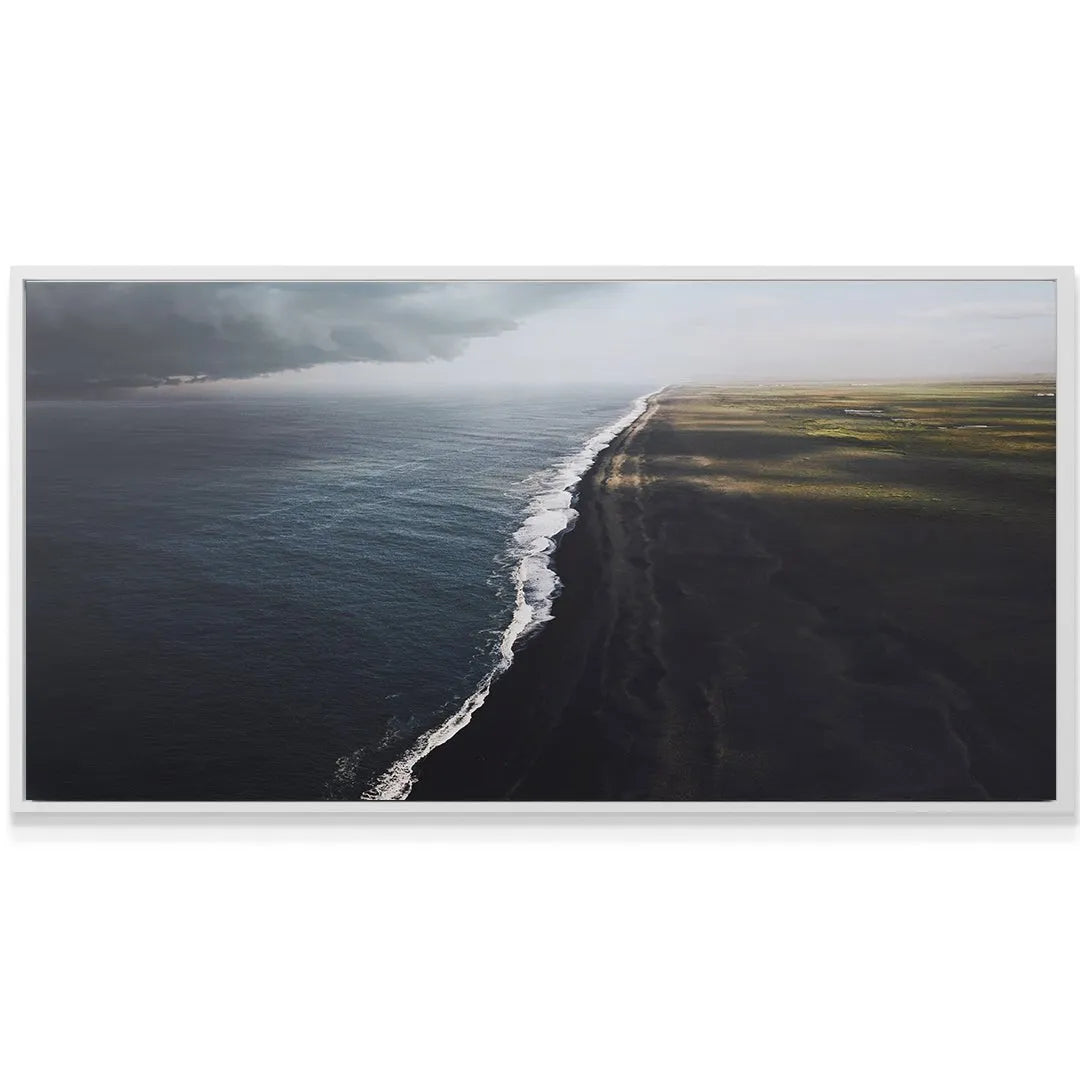Detailed view of the wave cresting white foam beneath the empowering message Every Storm Will Pass.