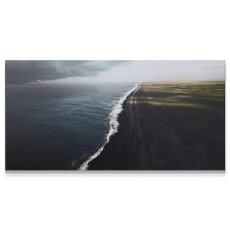 Extreme close-up of the frothy white surf line dividing the black sand and dark water, highlighting the texture of Every Storm Will Pass (No Quote) print.
