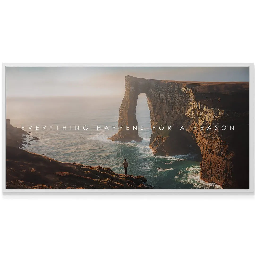 A small person standing on the cliff edge looking toward the vast ocean, framed by the quote Everything Happens For A Reason.
