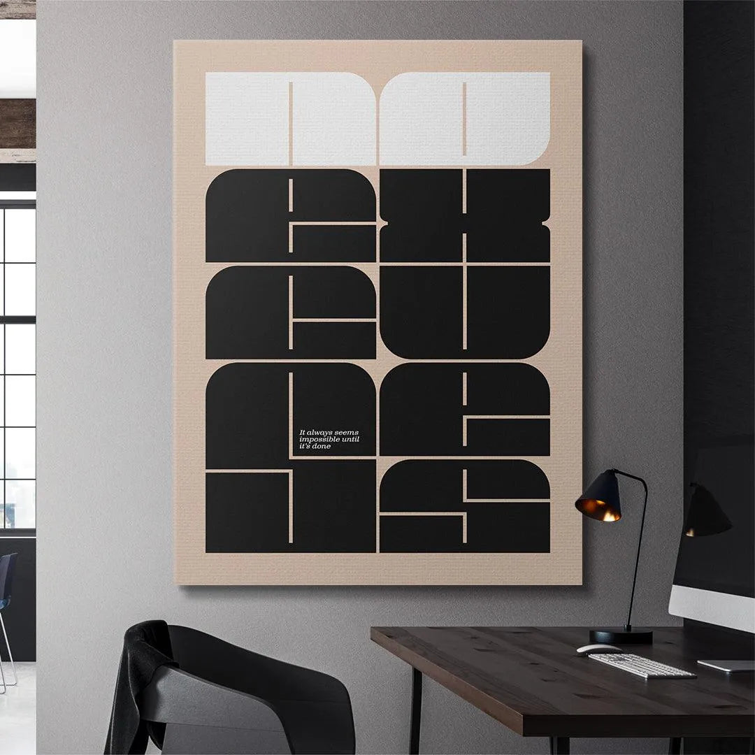 Lifestyle mock-up of the 'Excuses' print hanging above a contemporary home office desk.