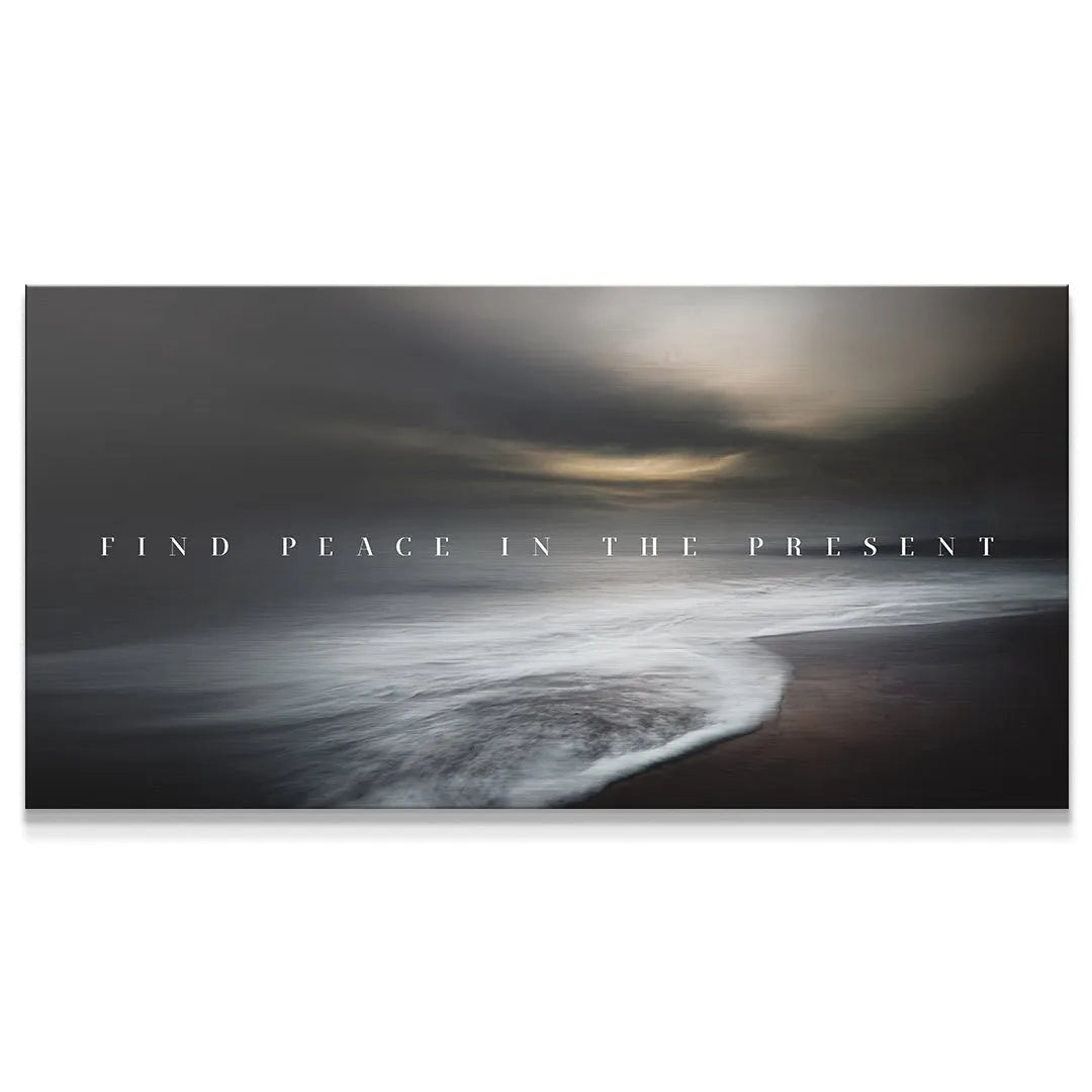 Dramatic seascape long exposure print reading 'Find Peace In The Present' centered on the horizon.