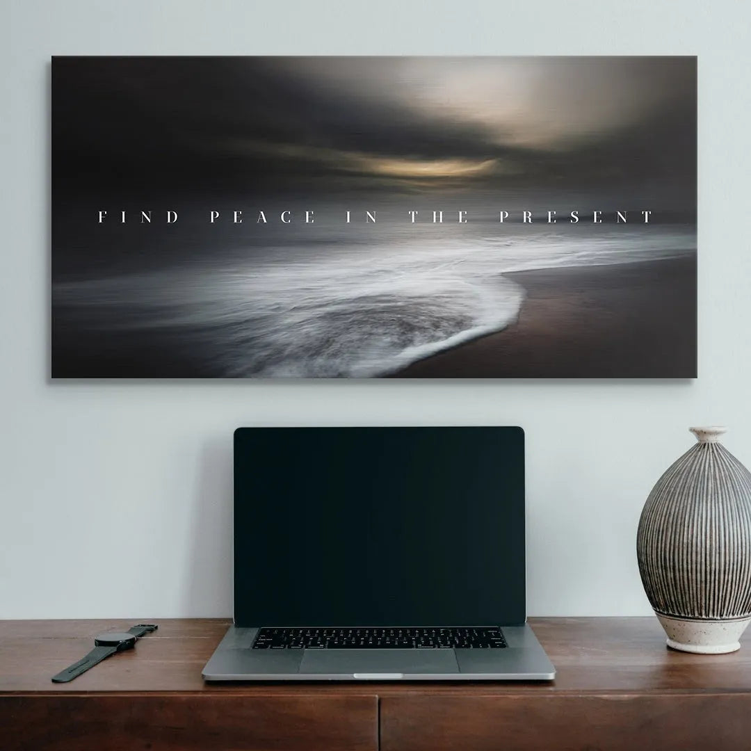 Wide panoramic view of the moody beach scene reminding us to Find Peace In The Present.