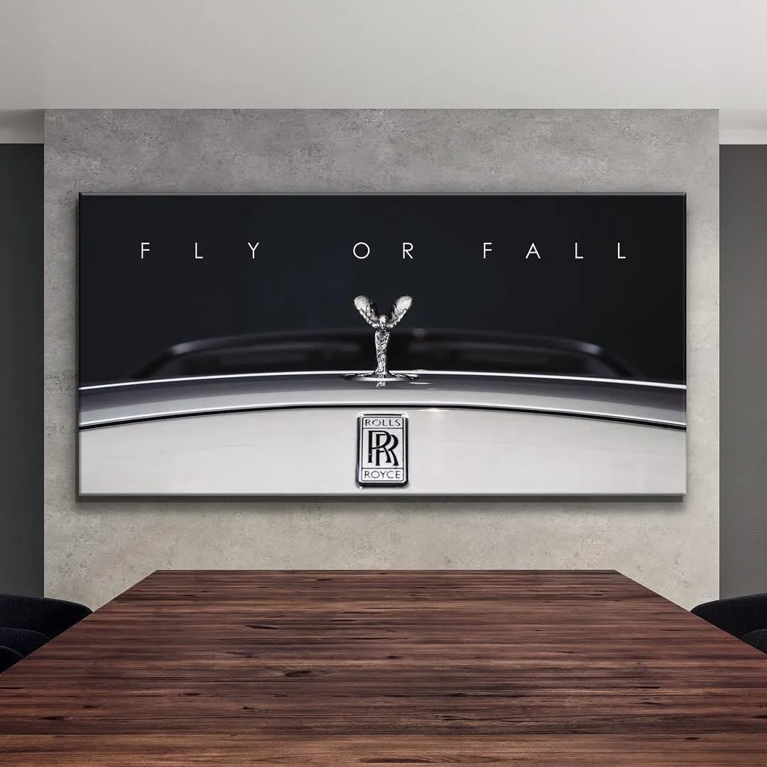 Detailed texture of the chrome finish on the classic car hood, titled 'Fly Or Fall'.