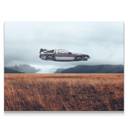 Cinematic long shot of the metallic gray Flying Object over vast amber fields in Iceland.