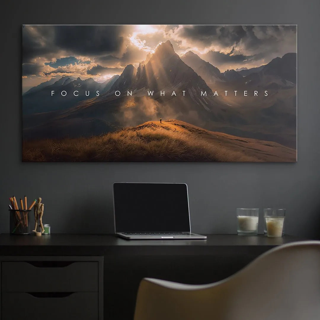 Inspirational wall art featuring deep shadows, high contrast, and the phrase Focus On What Matters
