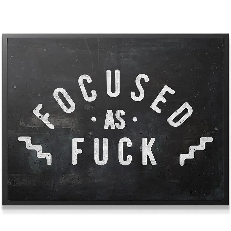 Full-view product shot of the chalkboard-style "Focused As Fuck" wall art against a white background.
