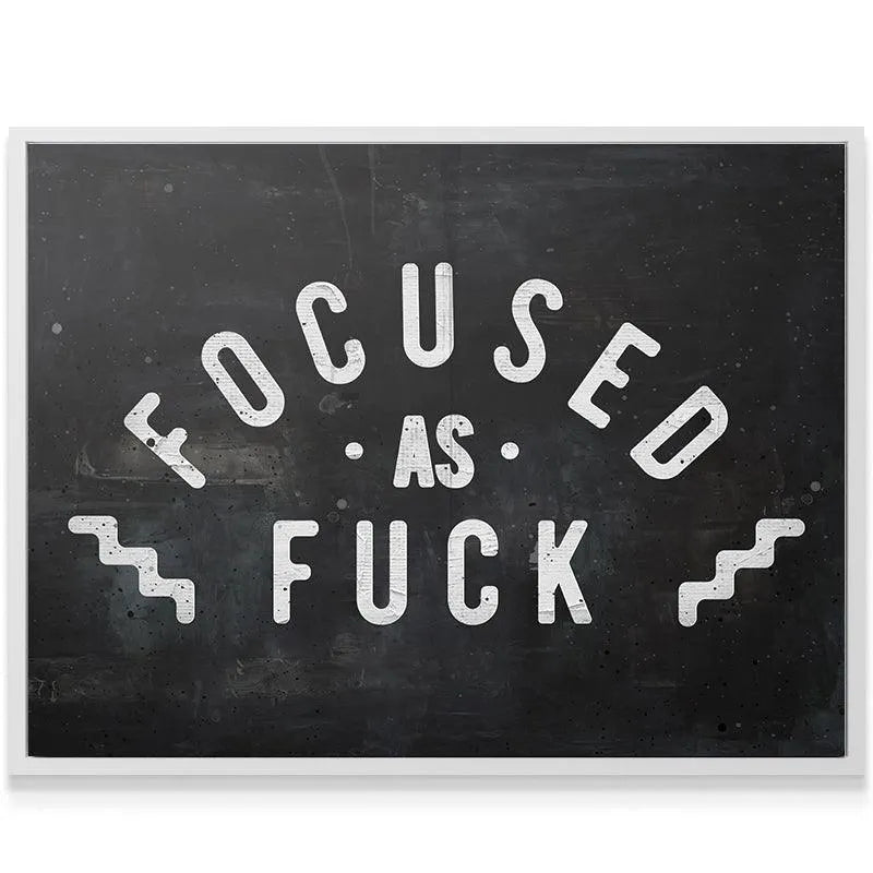 Angled shot of the modern framed poster emphasizing the bold, high-contrast text "Focused As Fuck."