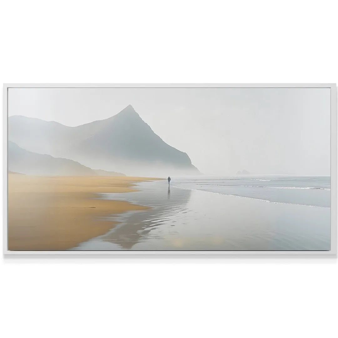 Close-up of the tiny solitary figure walking along the reflective tide line on the wet sand of the 'Foggy Beach'.