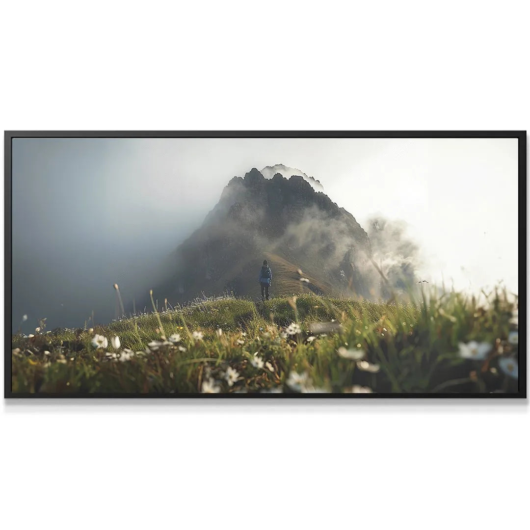Atmospheric landscape showing a rugged mountain peak half-hidden by mist, defining the Foggy Hike mood.