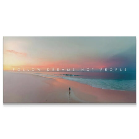 Wide shot of the "Follow Dreams Not People" panoramic canvas featuring a lone figure walking along the shore at sunset.