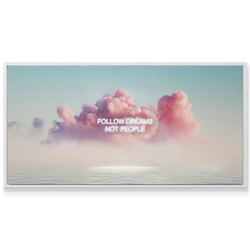 Lifestyle shot of the large canvas print 'Follow Your Dreams' hanging prominently in a minimalist office setting.