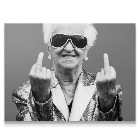 Close-up portrait of the rebellious senior woman with sunglasses expressing the 'Forever Young' attitude.
