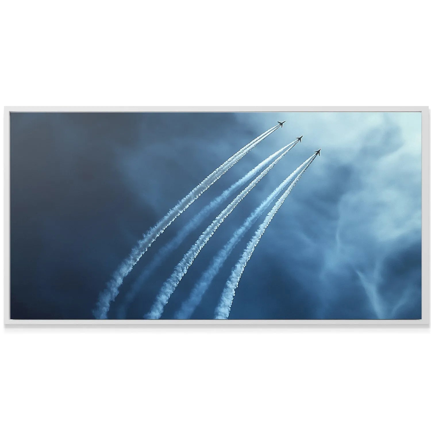 Dynamic angle looking up at the aerial Formation emphasizing height and speed.