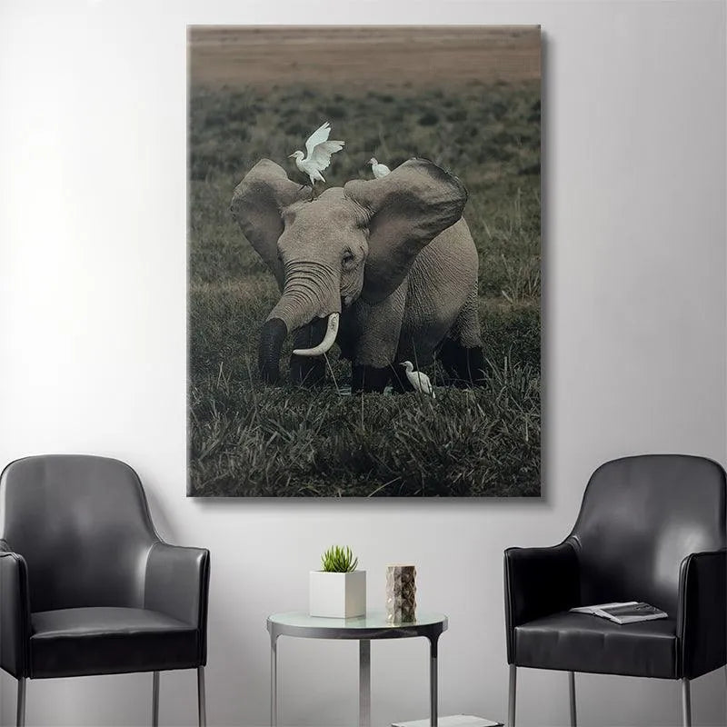 Low-angle shot emphasizing the scale difference between the elephant and its 'Friends from Far'.