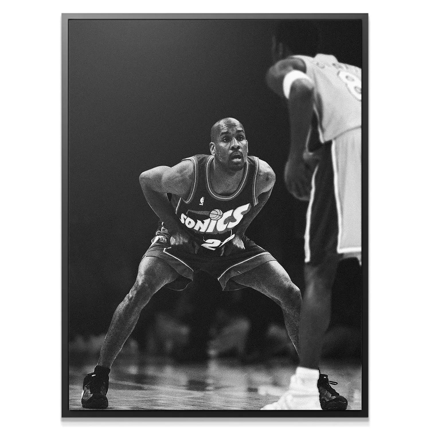 Close-up profile of Gary Payton - Defense, showing intense focus and determination on his face.