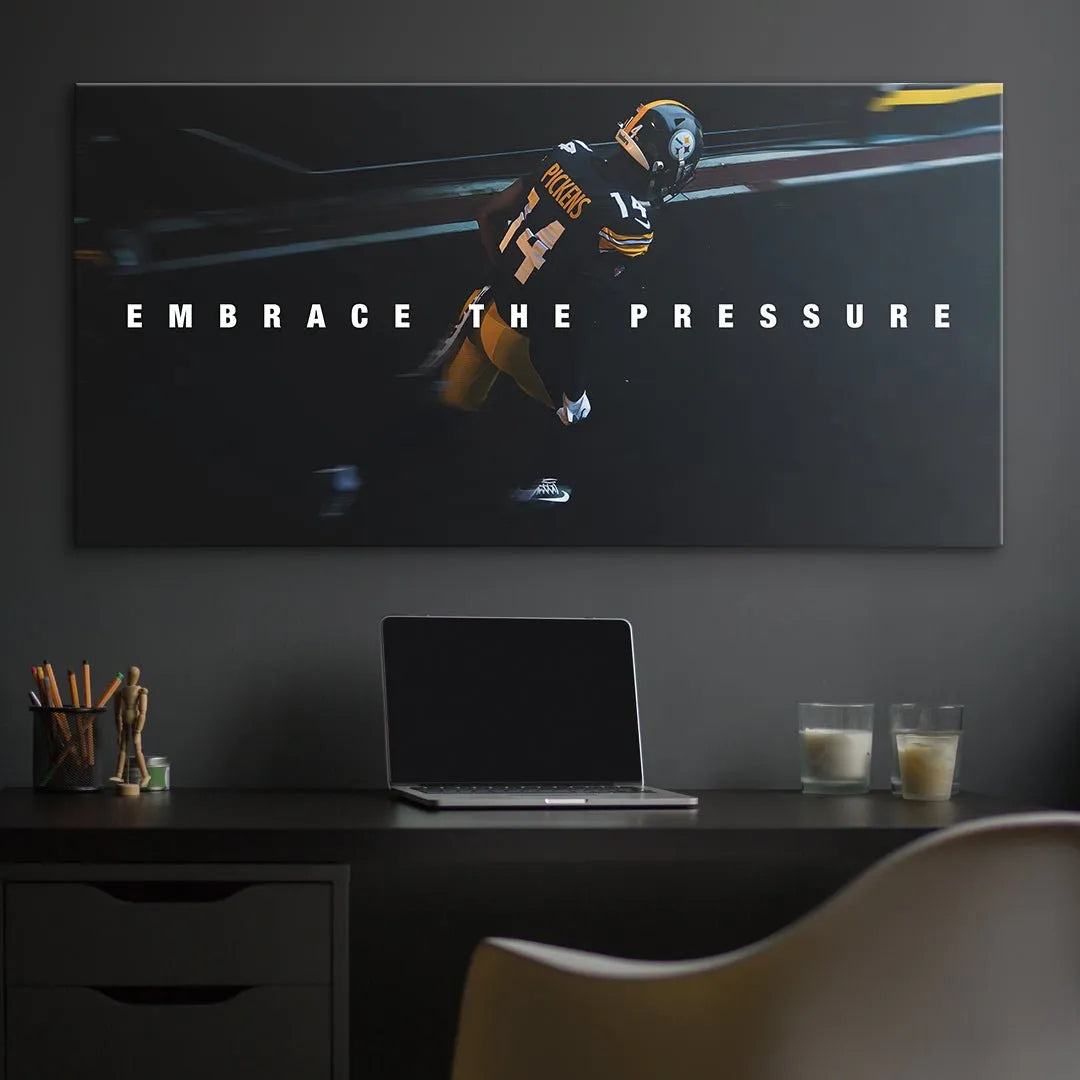 Lifestyle mock-up of the large wall art displaying George Pickens - Embrace The Pressure in a modern living room setting.