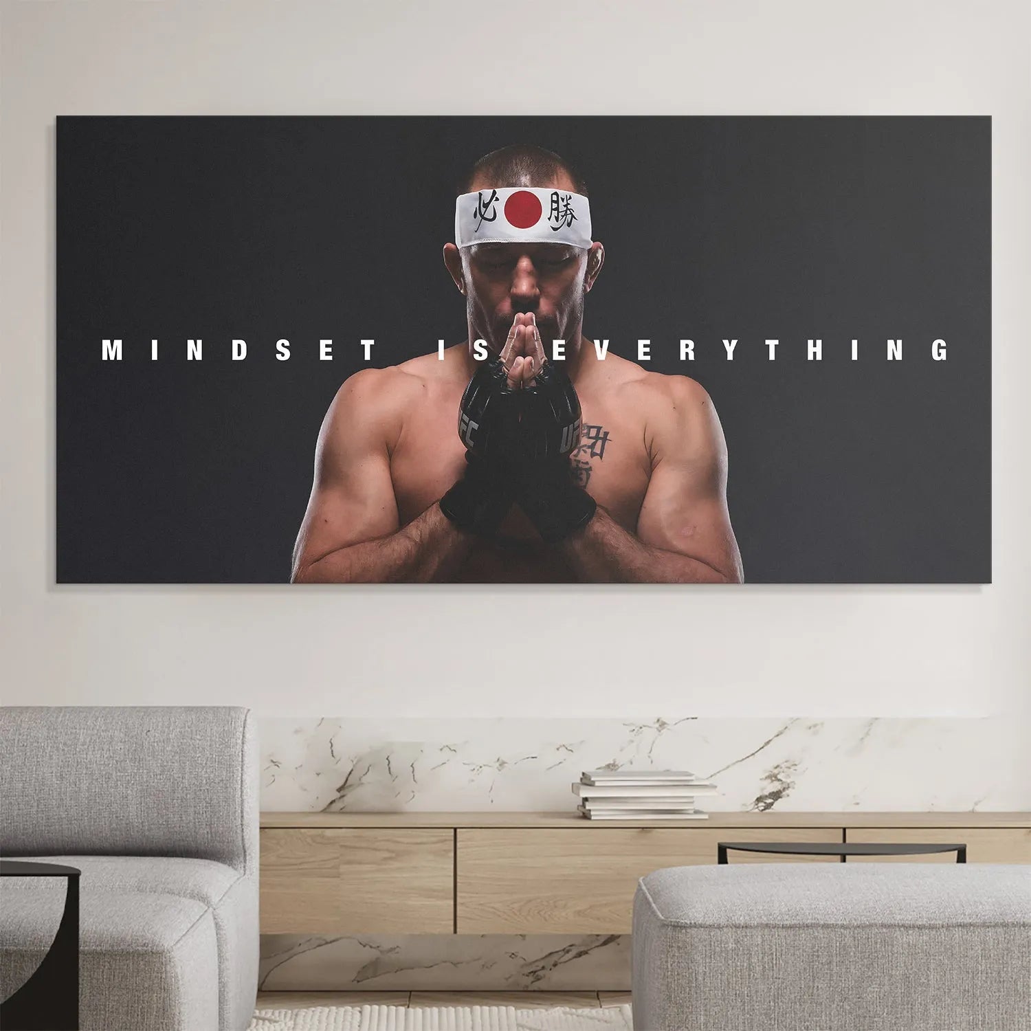 Mid-section view focusing on GSP's clasped hands and official UFC gloves in a posture of reflection | George St. Pierre - Mindset is Everything