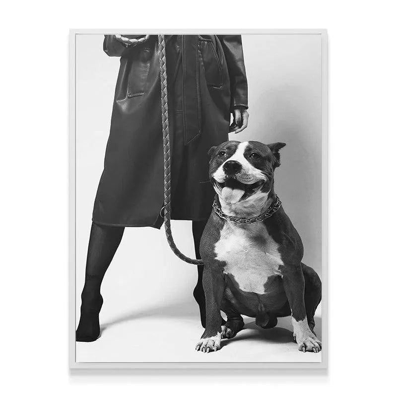 Detail shot emphasizing the texture of the braided leather leash held by the owner of the 'Girls Best Friend'.