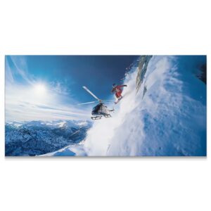 Wide-angle shot of skier and helicopter capturing the full scene in the deep mountains: Give Everything - Jump - No Quote.
