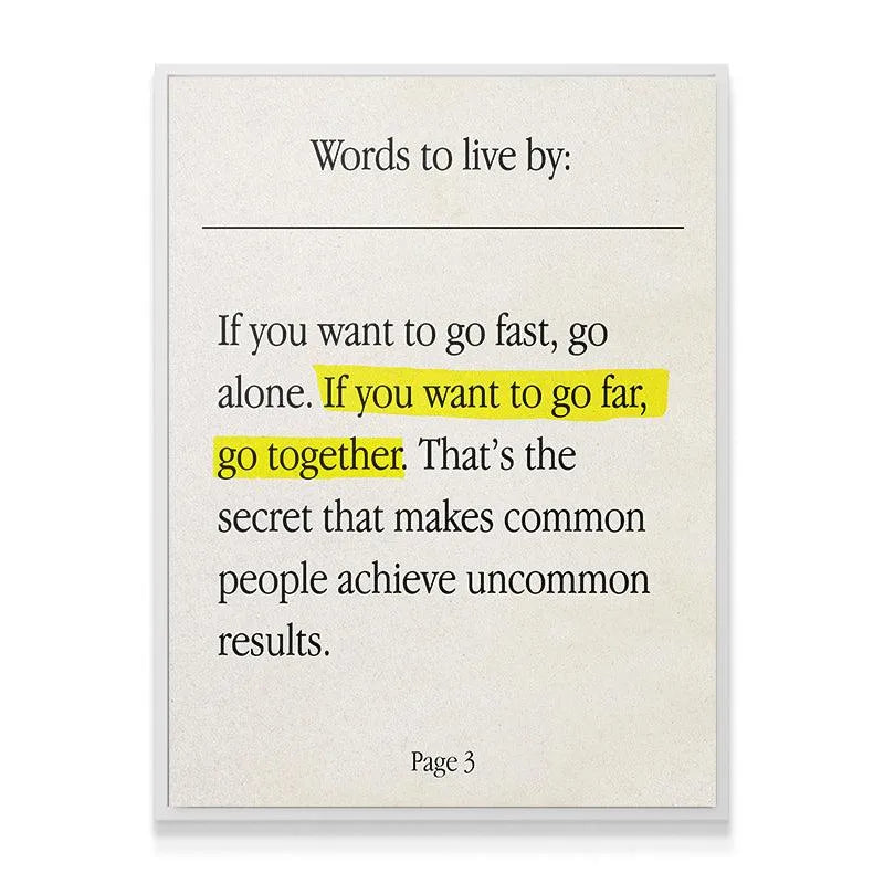 Lifestyle depiction of the framed print 'Go Together' hanging in a modern, collaborative office setting.