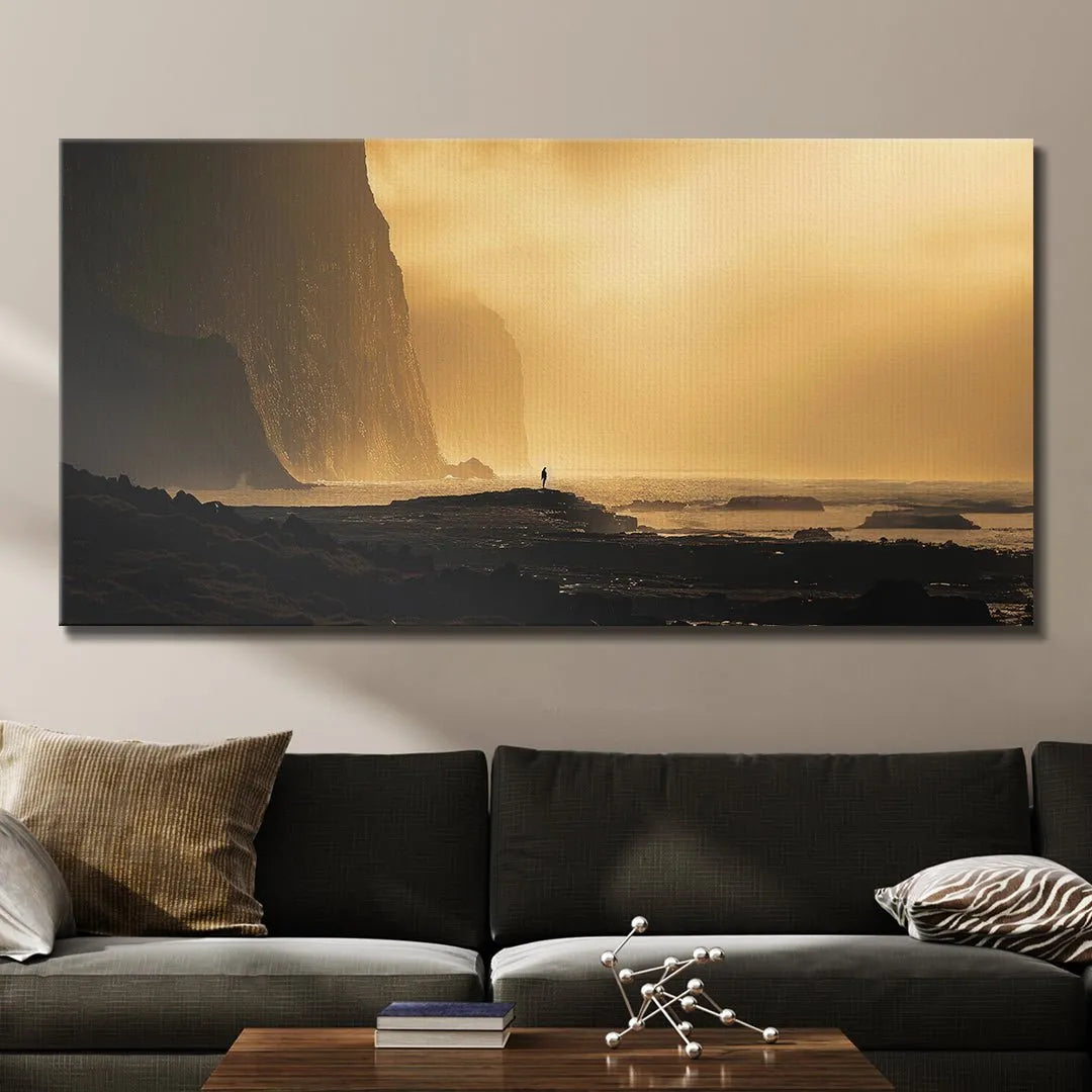 Lifestyle view of the Golden Coast canvas hanging above a minimalist sofa, emphasizing warmth.
