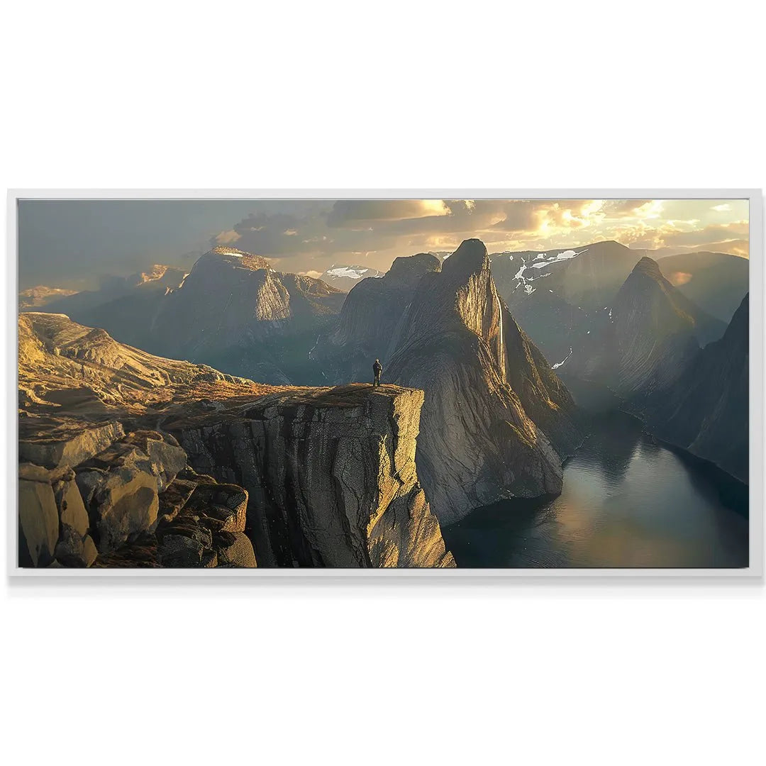 A vertical angle focusing on the sheer dramatic drop-off beside the majestic Golden Mountain.