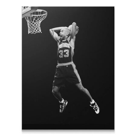 Action shot of Grant Hill - #1 mid-dunk against a pure black background.