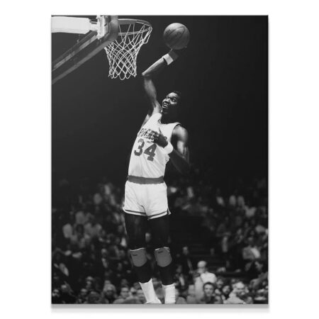 Close-up of Hakeem Olajuwon - #2's determined face during the iconic black and white dunk.