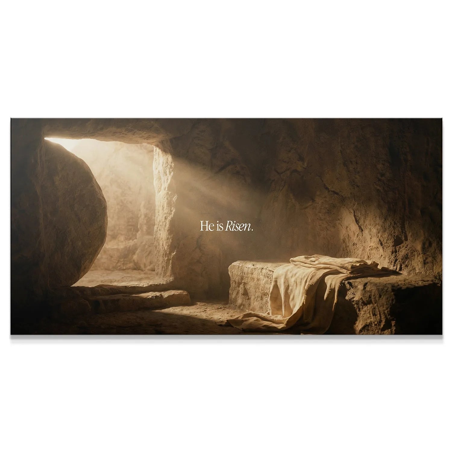 Full wide view of the dramatic light pouring into the He Is Risen – Empty Tomb.