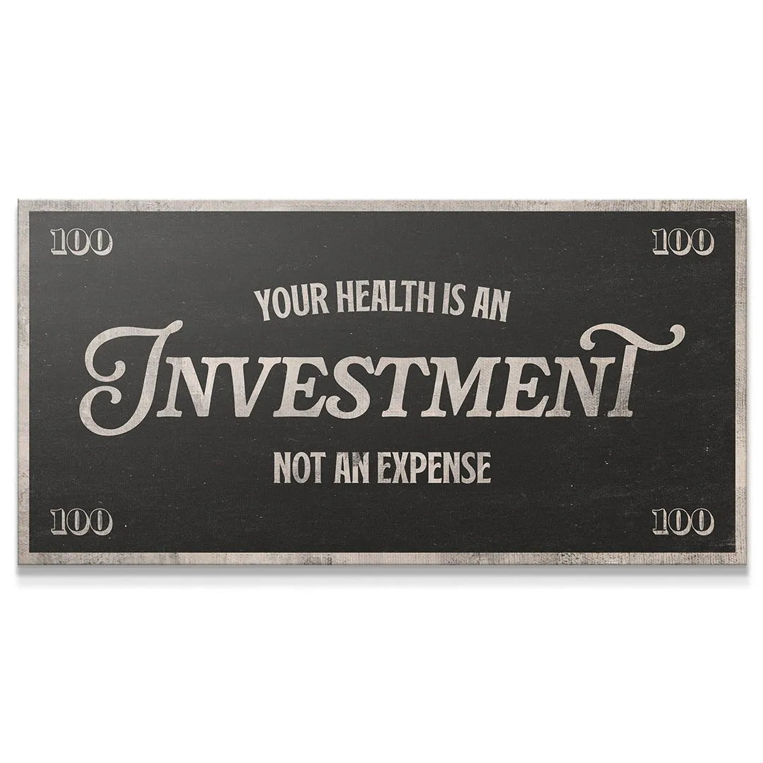 Close-up shot of the vintage white script font emphasizing that Health Is An Investment.