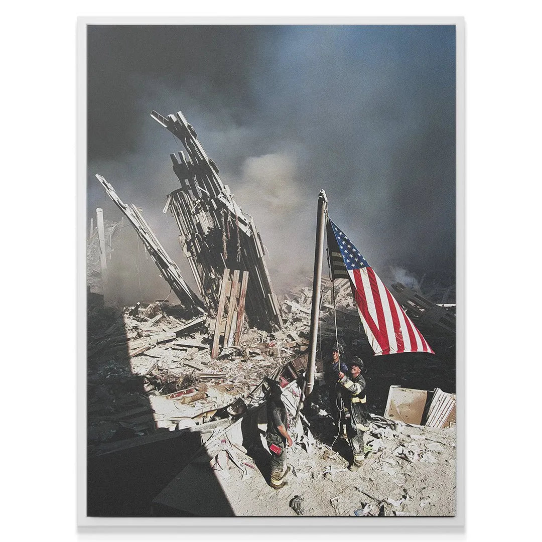 Texture focus on the gritty ground and broken concrete surrounding the 9/11 Heroes.