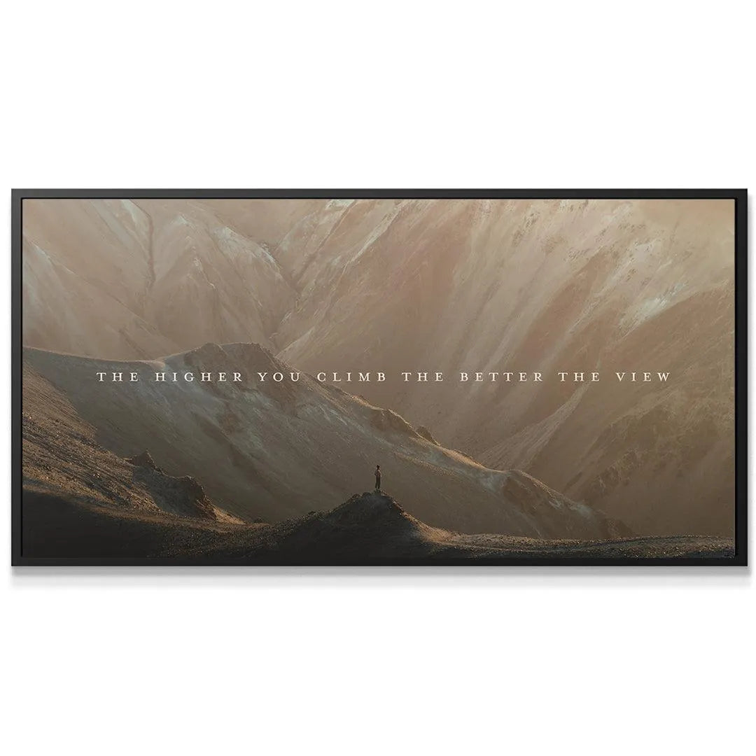 Wide horizontal view of the dramatic mountain ranges in the 'Higher You Climb' motivational print.