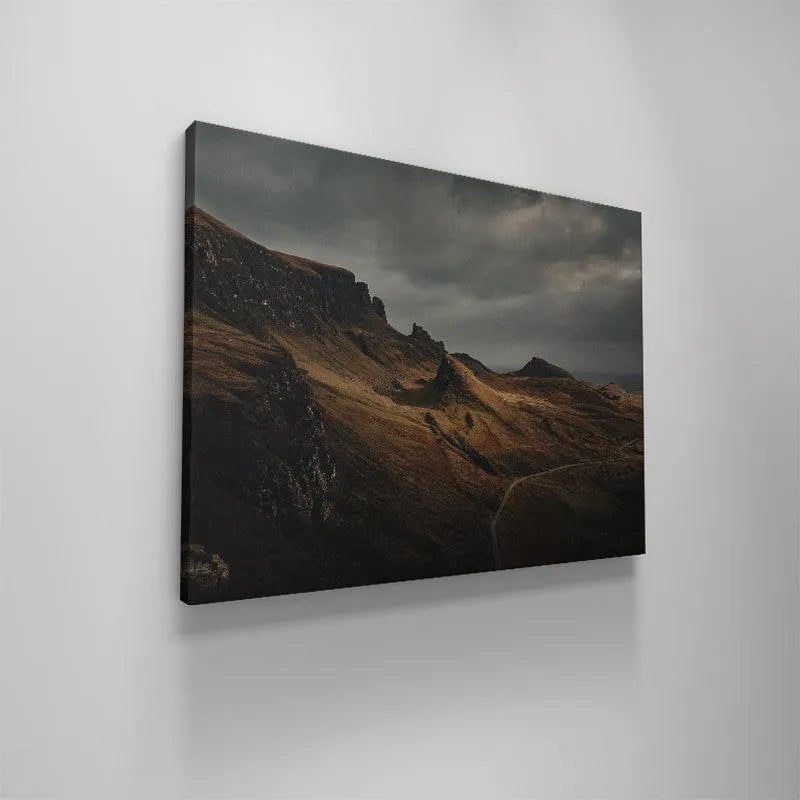 Lifestyle shot: 'Highland Roar' canvas hanging above a rustic wooden fireplace mantel.
