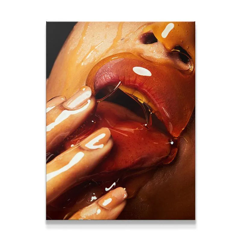 Extreme close-up of lips and fingers dripping with glossy, golden Honey texture.