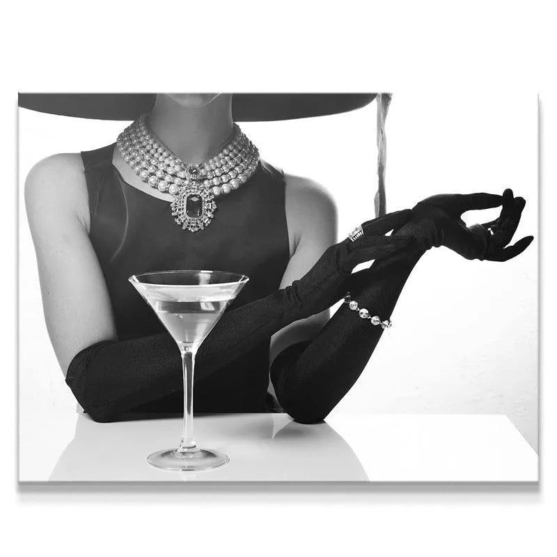 Black and white close-up of the pearl necklace and martini glass at the Hotel Bar scene.