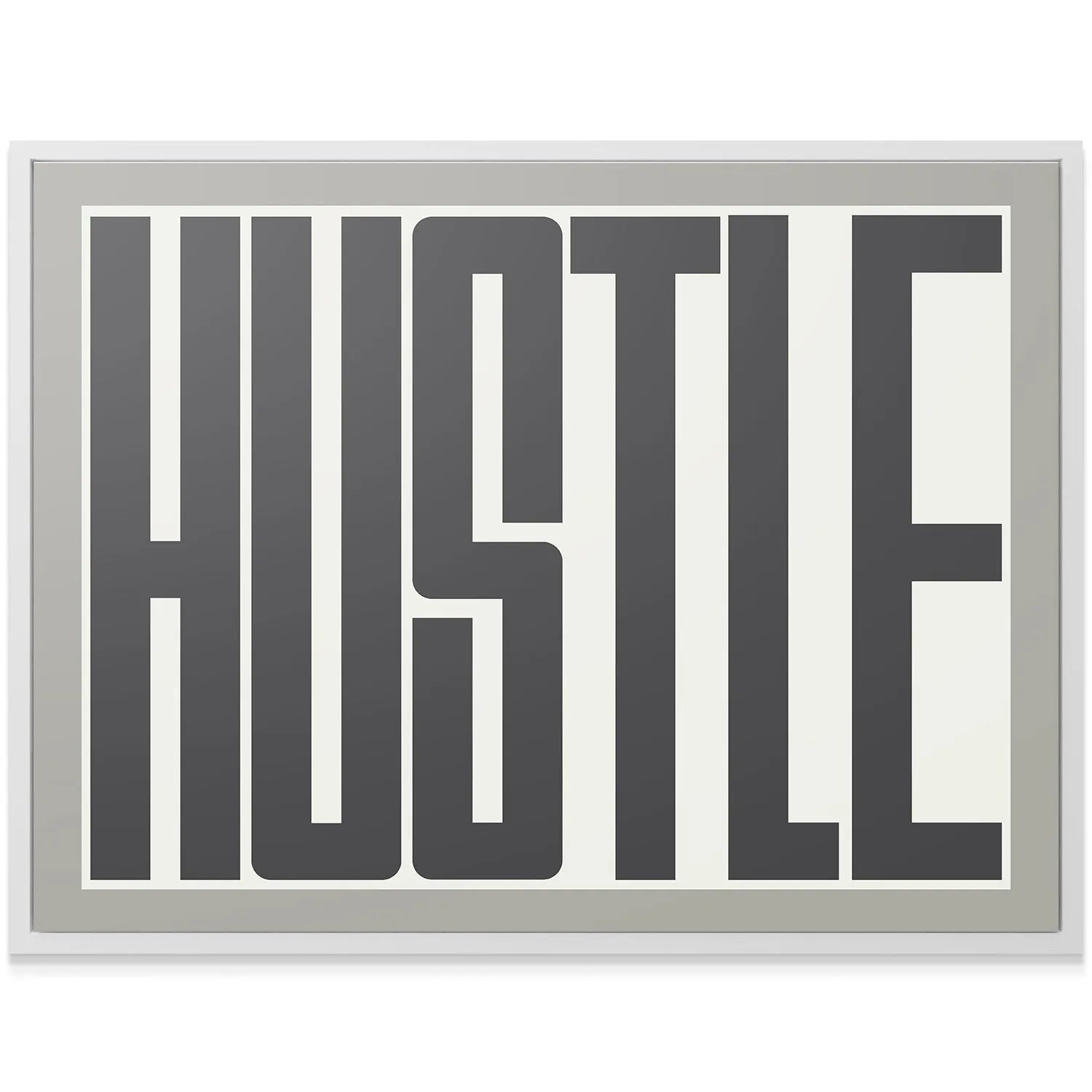 Lifestyle image featuring the framed Hustle artwork hanging prominently in a modern home office setting.